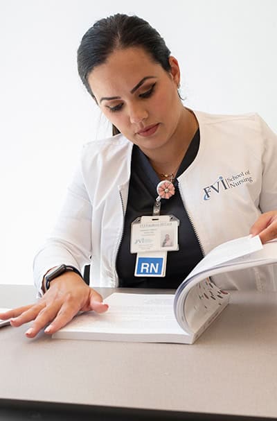 florida RN nursing school professor reading her book