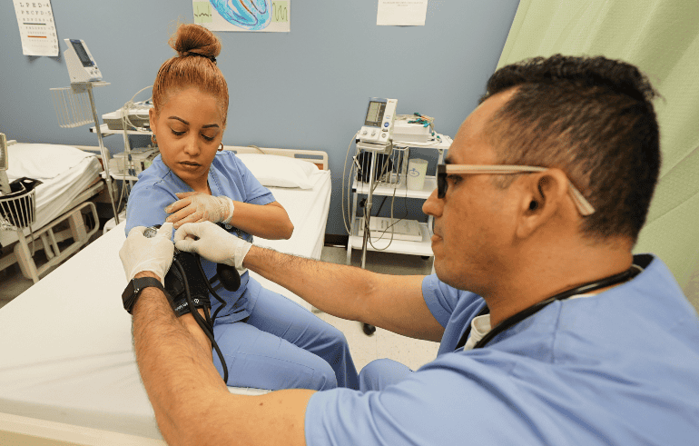 miramar medical assistant training program students taking blood pressure