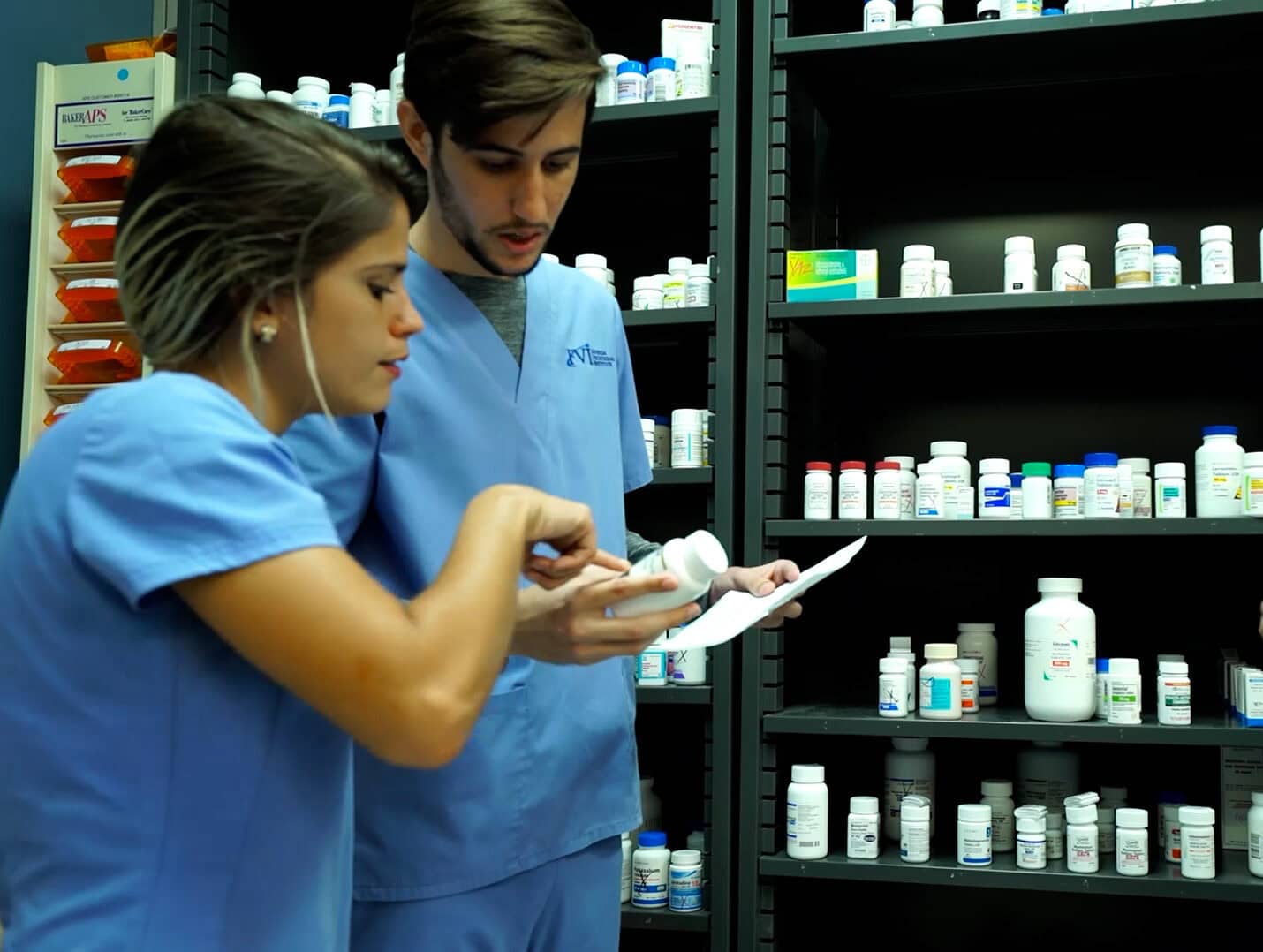 Miami Pharmacy technician program students practicing in FVI's pharmacy lab