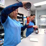 Miami pharmacy technician program classes: students working with medicine