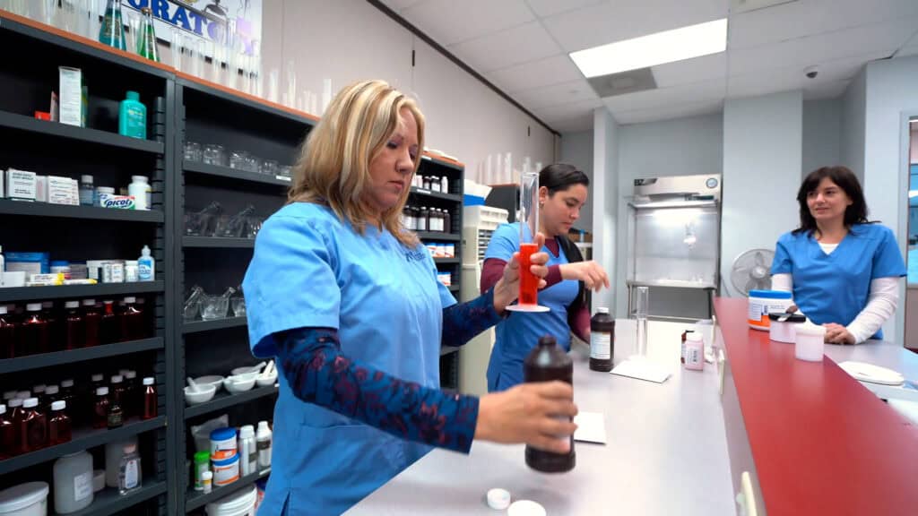 Miami pharmacy tech student classes: practicing at the pharmacy lab