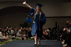 in home health aide helping elderly man