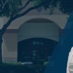 FVI miramar nursing school student in front of miramar campus