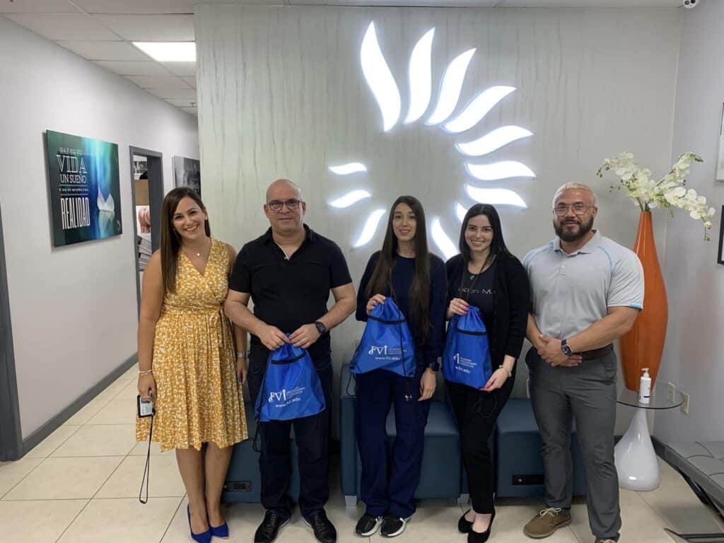 vanessa from career services giving donations to our employer partners