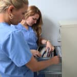 fvi students looking through documents