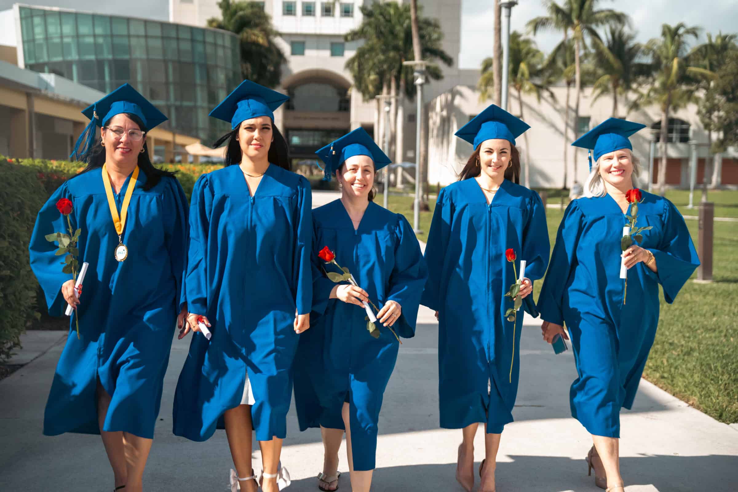 five Miami allied health program graduates walking