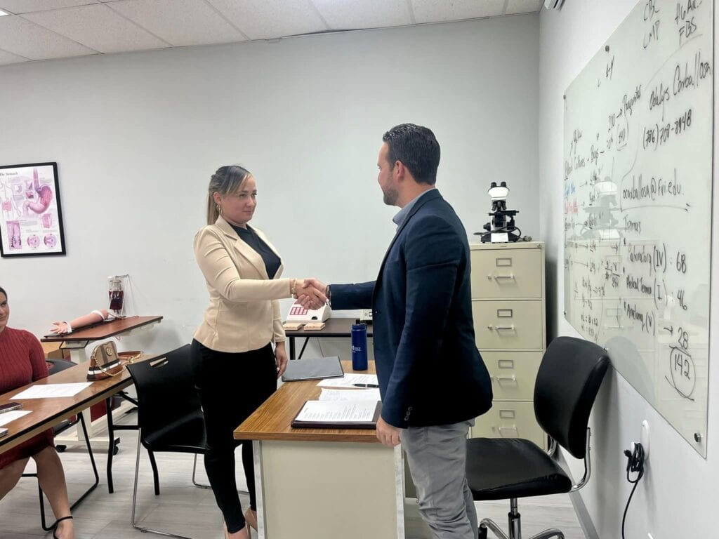 joel doing mock interviews with fvi students