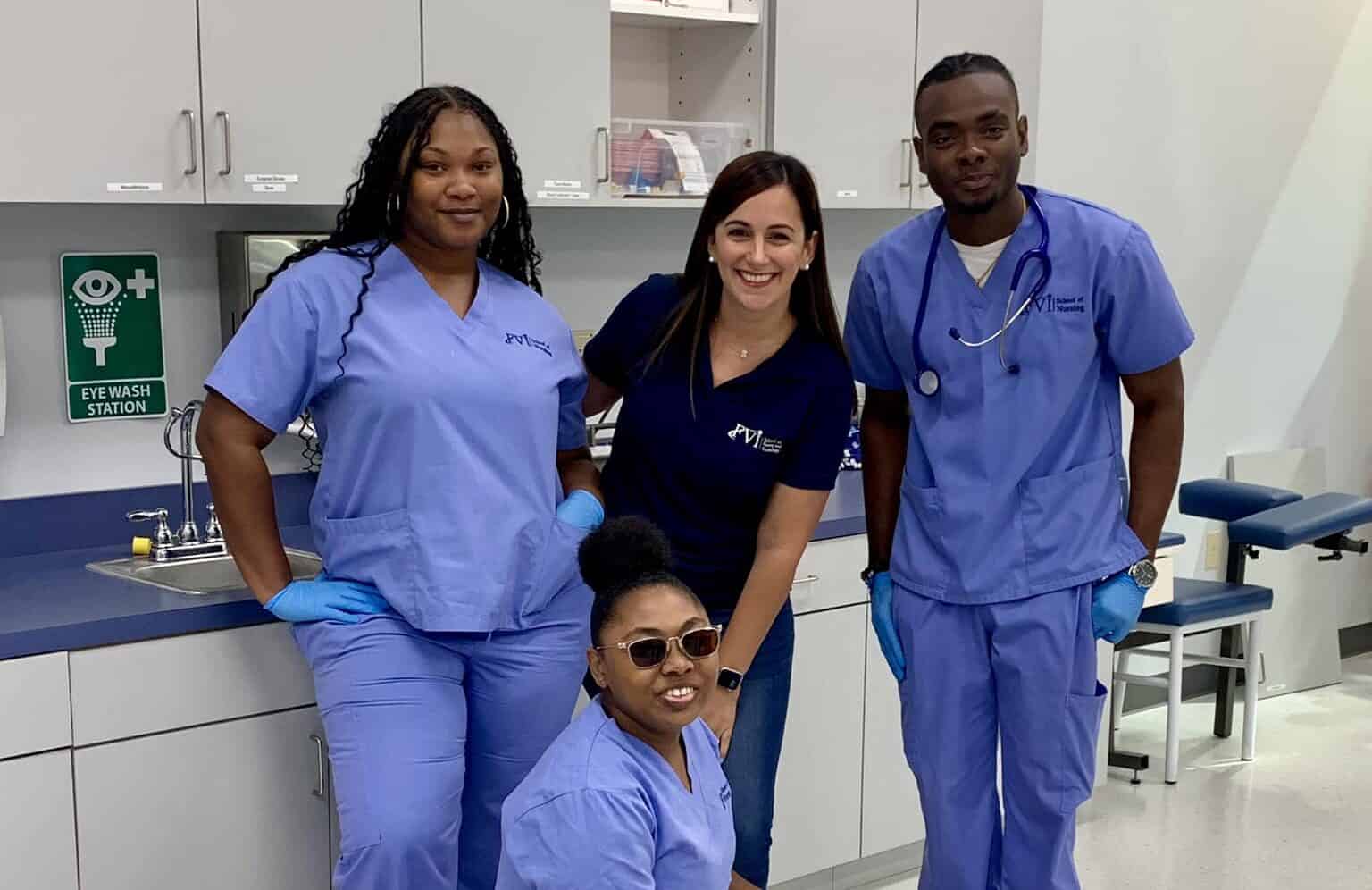 A member of the FVI career services team with 3 Miami nursing school students in a classroom