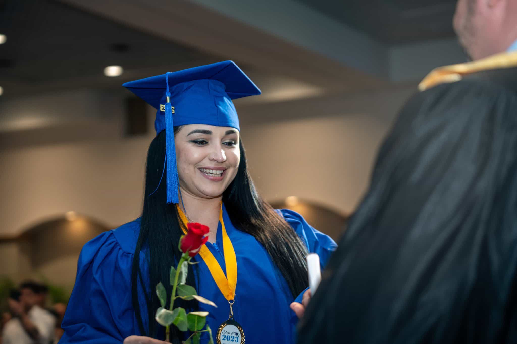 allied health graduate on stage fall 2023