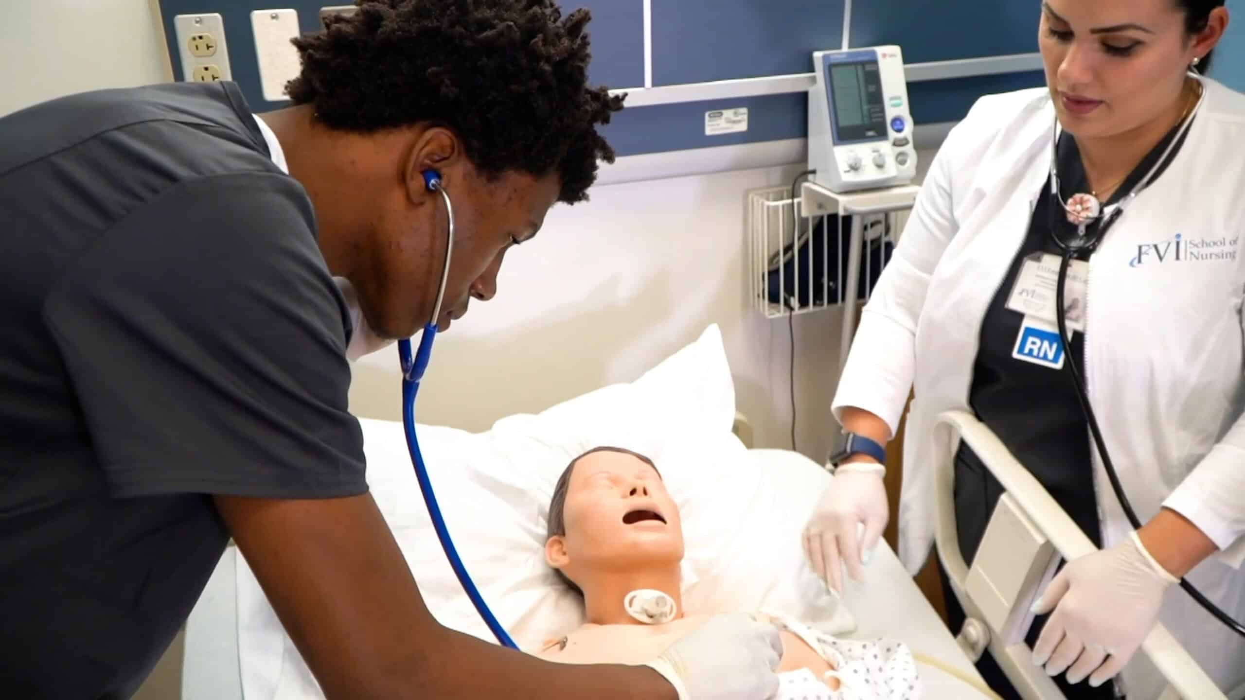 Miami ASN nursing school students hands on skills: taking patient vitals