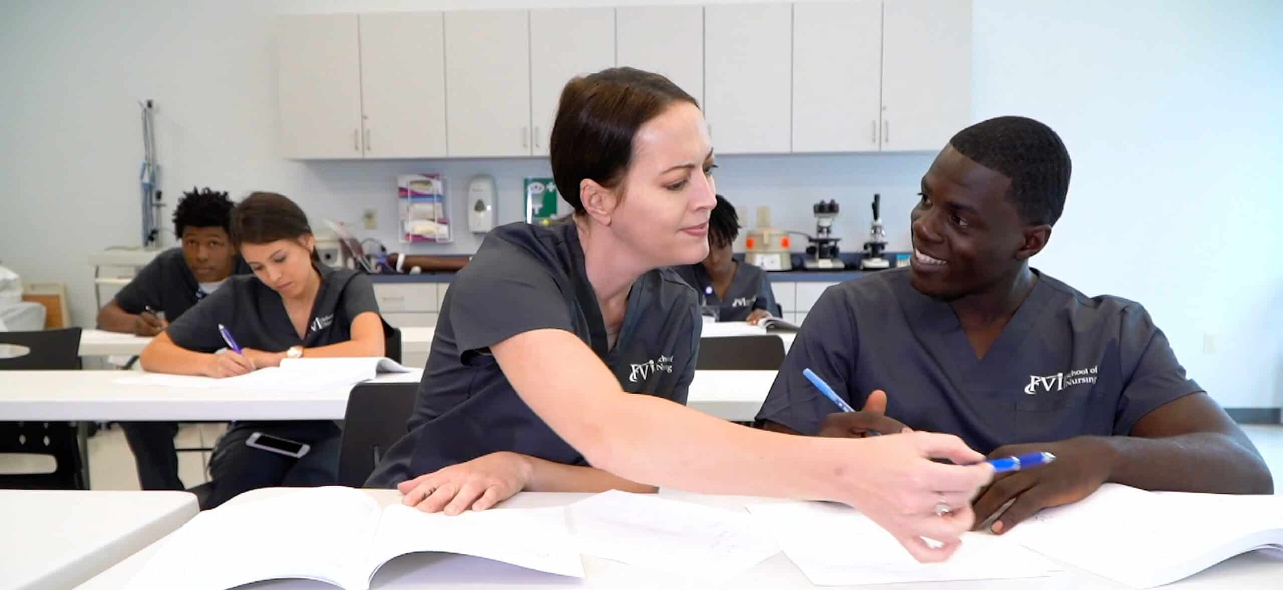 Miami nursing school students working together in the classroom