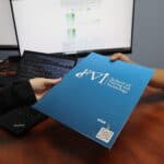 FVI nursing school admissions rep handing a student an FVI flyer