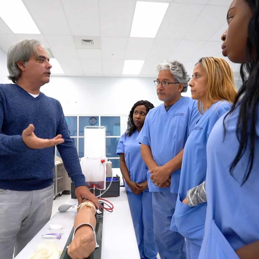 professor fabian teaching Miami medical assistant school students