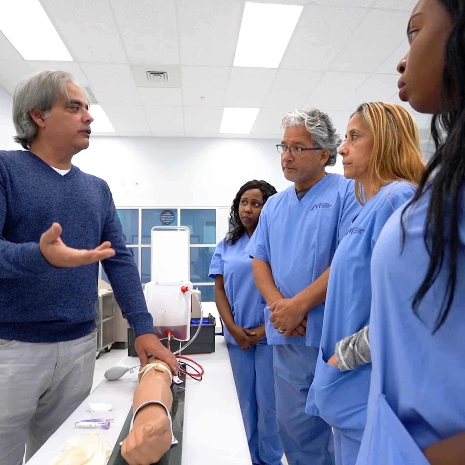 professor fabian teaching Miami medical assistant school students