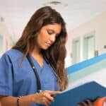 medical assistant working - reading patient charts