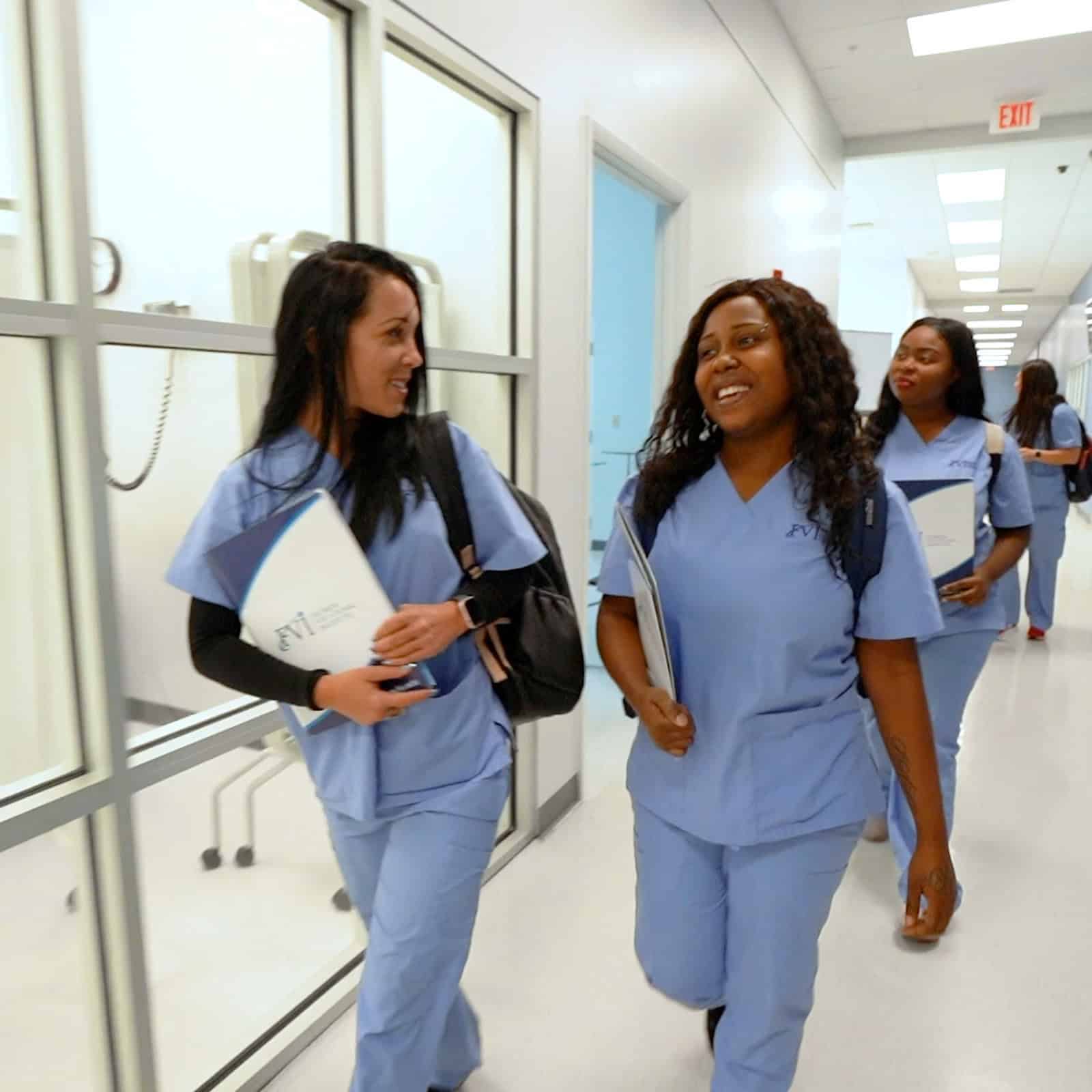 medical assistant training program students in Miami and Miramar on campus talking