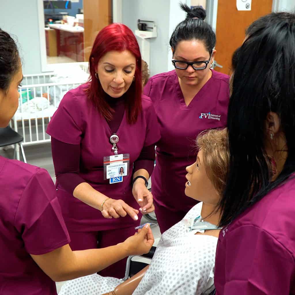 licensed practical nursing students hands on training with instructors in miami fl
