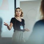 Jacqui Bryan presenting at a health coach clinic - health coach certification program